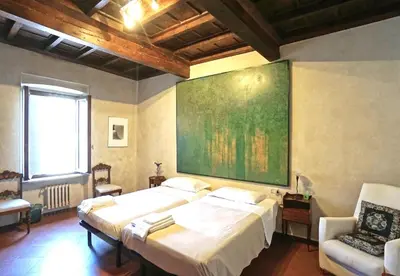 Letto o letti in una camera di Casa del Pittore