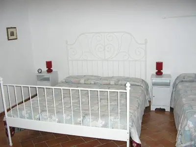 Letto o letti in una camera di B&B IL BOSCHETTO