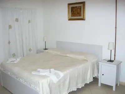 Letto o letti in una camera di B&B IL BOSCHETTO