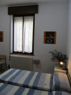 Letto o letti in una camera di B&B da NINA