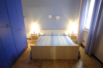Letto o letti in una camera di Casavacanzedezza