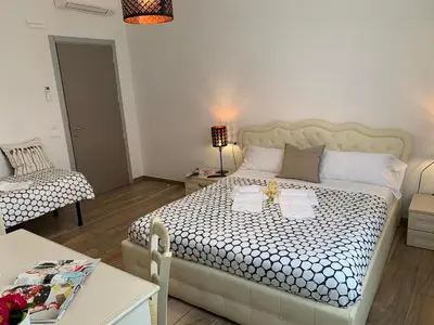 Letto o letti in una camera di Affittacamere Il Borgo
