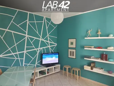 TV o dispositivi per l'intrattenimento presso LAB42 City & San Matteo Apartment - 2 Bedrooms
