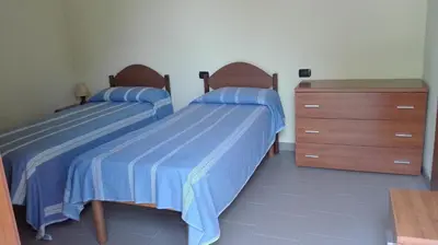Letto o letti in una camera di Locanda Lago Bleu