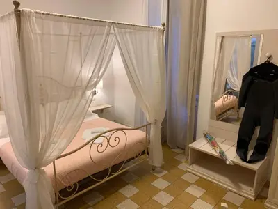 Letto o letti in una camera di Affittacamere LevantoMare