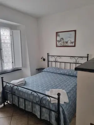 Letto o letti in una camera di Hotel Paese Corvara