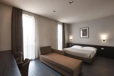 Letto o letti in una camera di Casalgrande Hotel