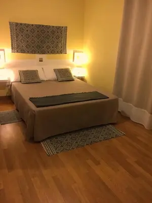 Letto o letti in una camera di RESIDENZA SERENA B&B - Centro Storico