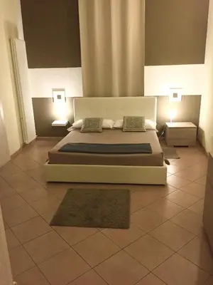 Letto o letti in una camera di RESIDENZA SERENA B&B - Centro Storico