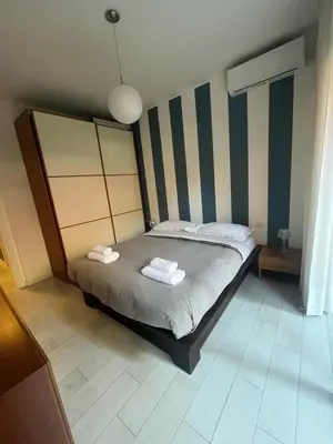 Letto o letti in una camera di Casa Lavagna giardinetto