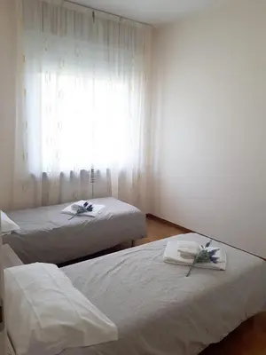 Letto o letti in una camera di Casa Claudia
