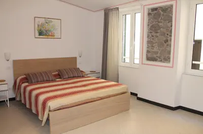 Letto o letti in una camera di Marianna Quiet Rooms
