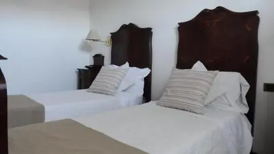 Letto o letti in una camera di Albergo & Ristorante Selvatico