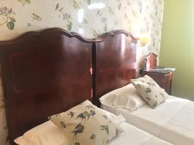Letto o letti in una camera di Albergo & Ristorante Selvatico
