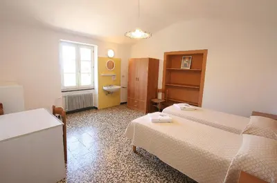 Letto o letti in una camera di Santuario NS Soviore Cinque Terre
