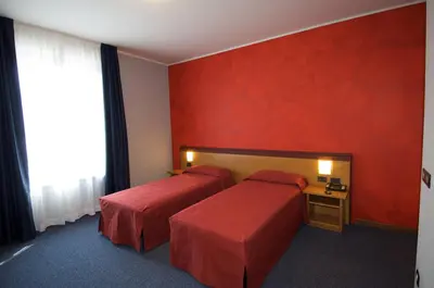 Letto o letti in una camera di Hotel Residence Ducale