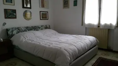 Letto o letti in una camera di B&B All'Aeroporto