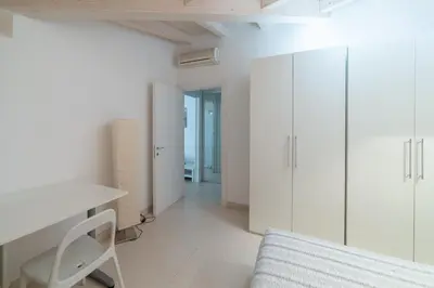 Letto o letti in una camera di La Betulla