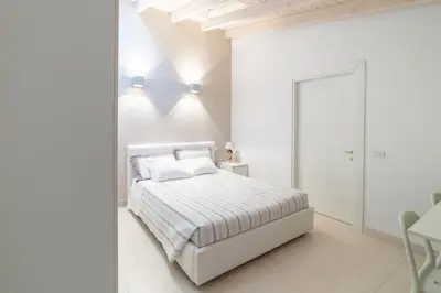 Letto o letti in una camera di La Betulla