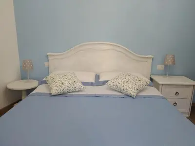 Letto o letti in una camera di La Pomella