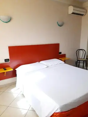 Letto o letti in una camera di Affittacamere Cigole