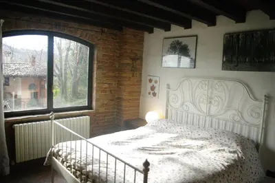 Letto o letti in una camera di La Casa Sopra Le Nuvole