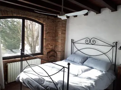 Letto o letti in una camera di La Casa Sopra Le Nuvole