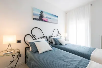 Letto o letti in una camera di Attico Del Duomo
