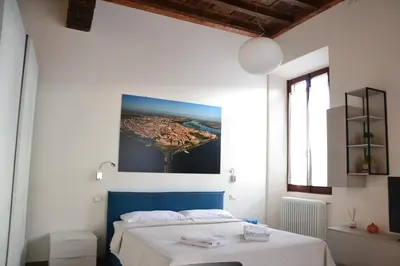 Letto o letti in una camera di Casa degli Scacchi