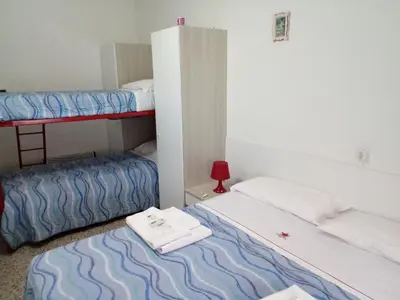 Letto o letti in una camera di London Cafè