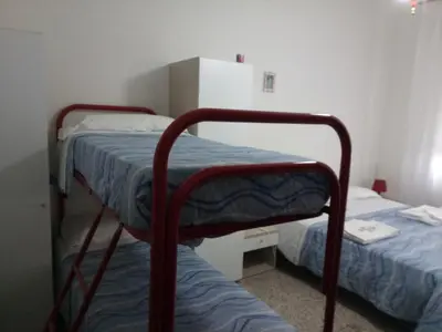 Letto o letti in una camera di London Cafè