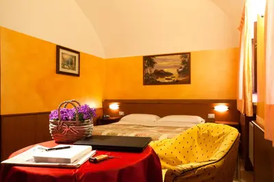 Letto o letti in una camera di Hotel Antica Fonte