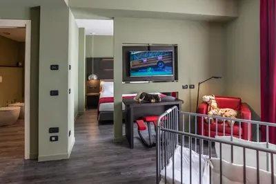 Letto o letti in una camera di Maranello Palace