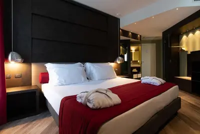 Letto o letti in una camera di Maranello Palace