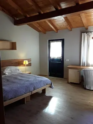 Letto o letti in una camera di Sostio a Levante