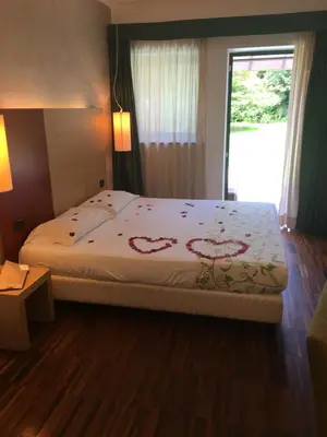 Letto o letti in una camera di Cascina Scova Resort