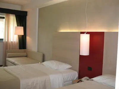 Letto o letti in una camera di Cascina Scova Resort