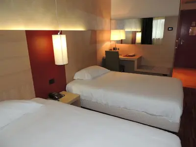 Letto o letti in una camera di Cascina Scova Resort