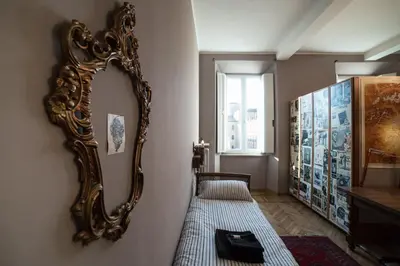 Letto o letti in una camera di Casa Mappamondo