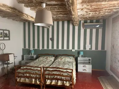 Letto o letti in una camera di Fattoria Amelia