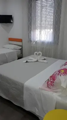 Letto o letti in una camera di Dolce Vita Lovely Suites