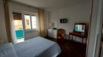TV o dispositivi per l'intrattenimento presso Appartamento Azzurro Mare