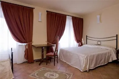 Letto o letti in una camera di La Campana D'Oro