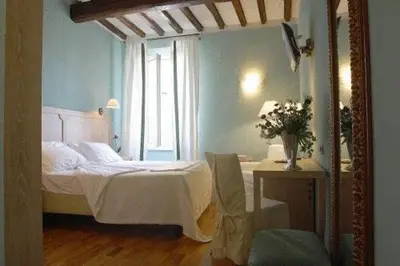 Letto o letti in una camera di Albergo Morandi