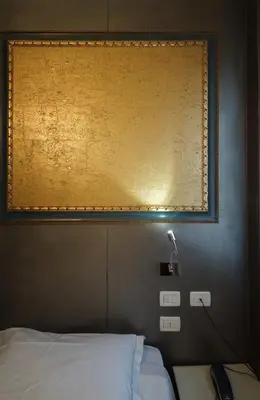 Letto o letti in una camera di Albergo Morandi