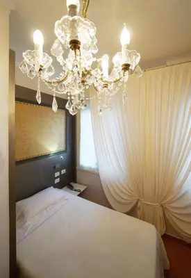 Letto o letti in una camera di Albergo Morandi