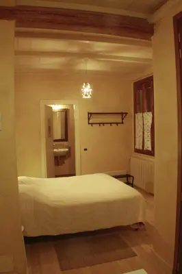 Letto o letti in una camera di B&B Nascondino