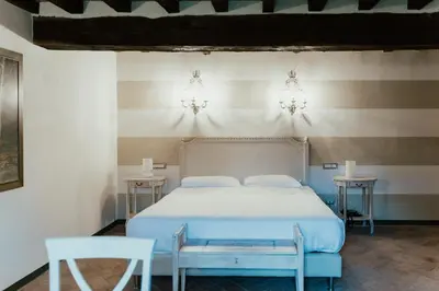 Letto o letti in una camera di Locanda Del Re Guerriero