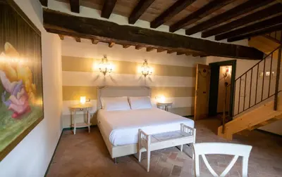 Letto o letti in una camera di Locanda Del Re Guerriero