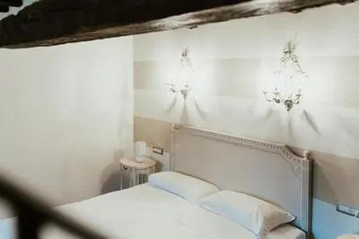 Letto o letti in una camera di Locanda Del Re Guerriero